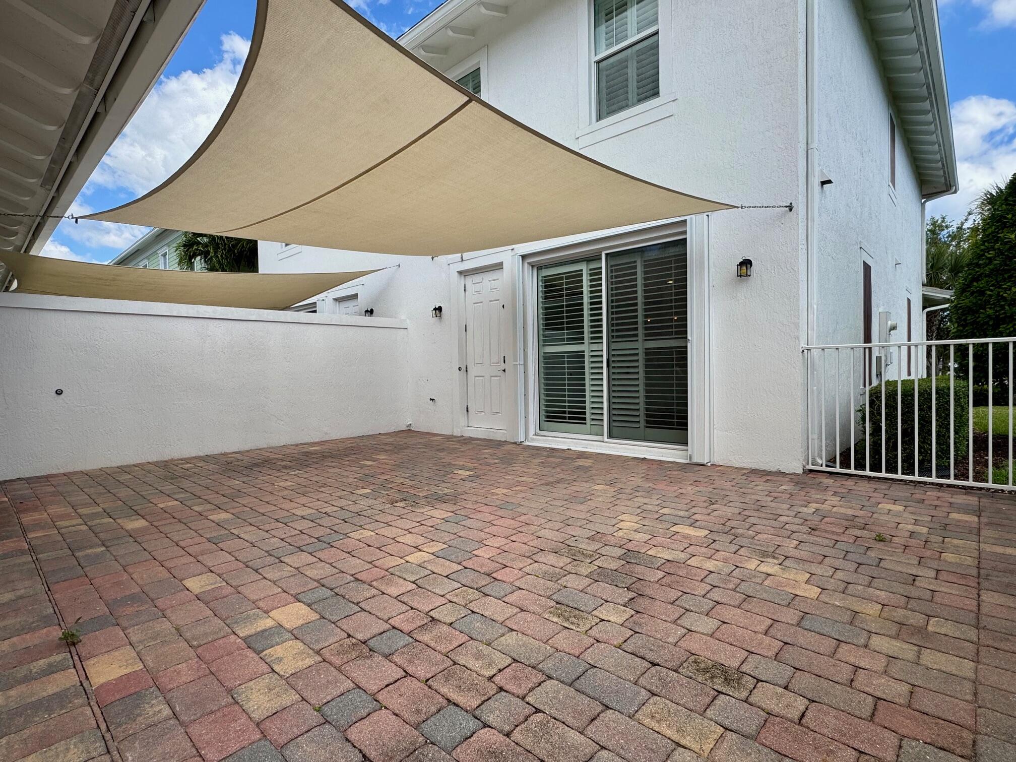 1346 Turnbridge Drive Jupiter, FL 33458 - Photo 15 of 46 front view of a house