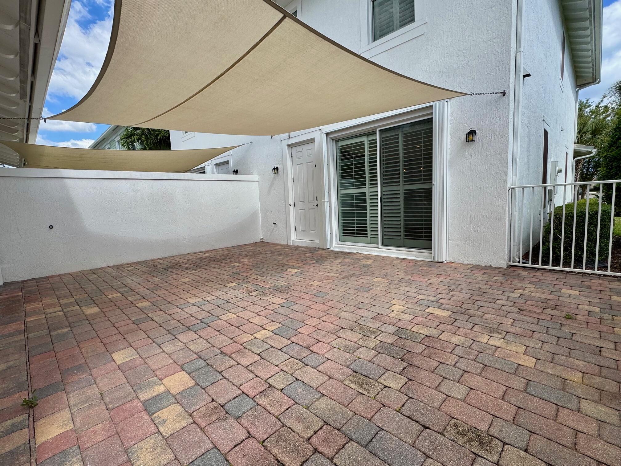 1346 Turnbridge Drive Jupiter, FL 33458 - Photo 17 of 46 an empty room with windows