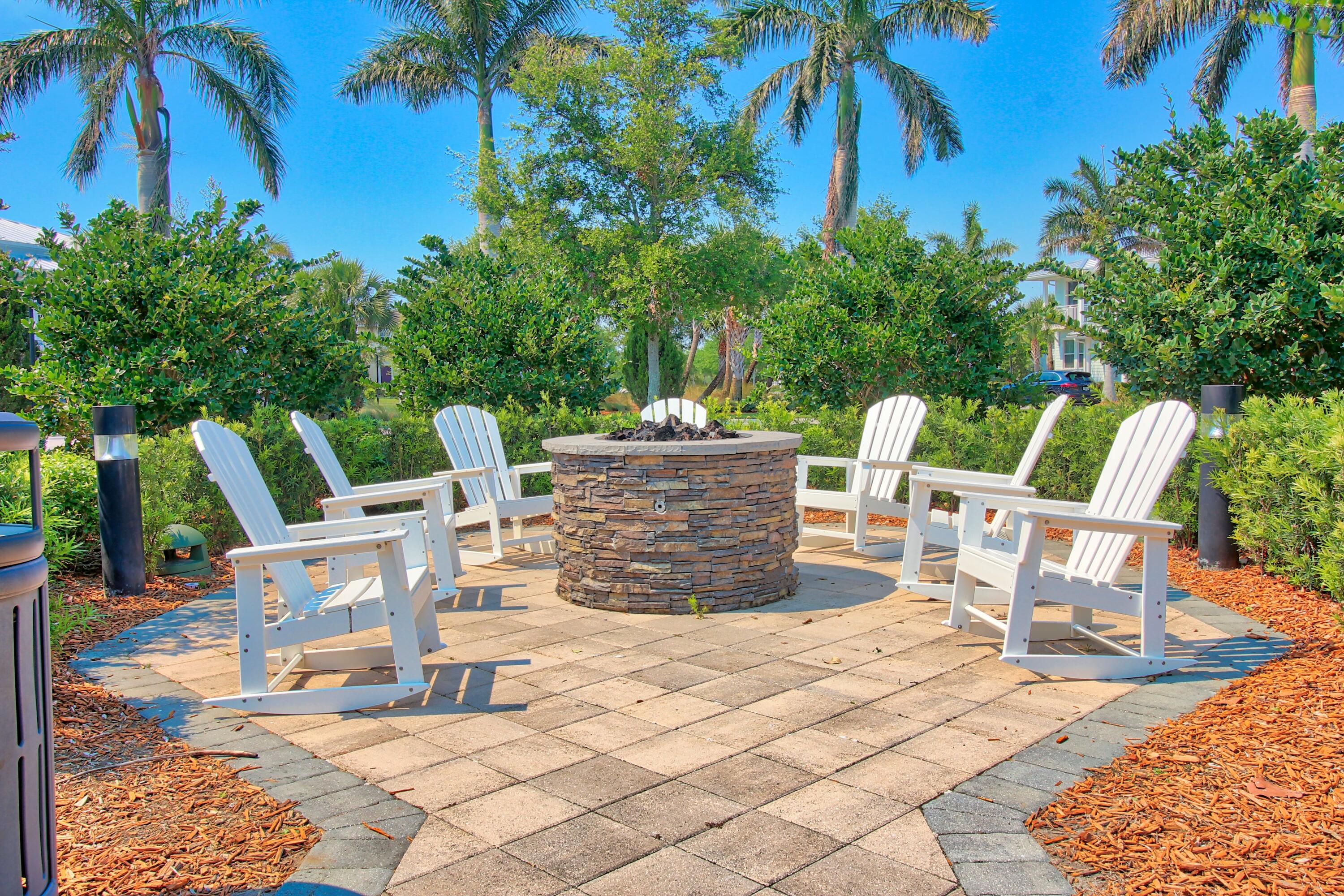 1346 Turnbridge Drive Jupiter, FL 33458 - Photo 36 of 46 a view of an outdoor space with seating area