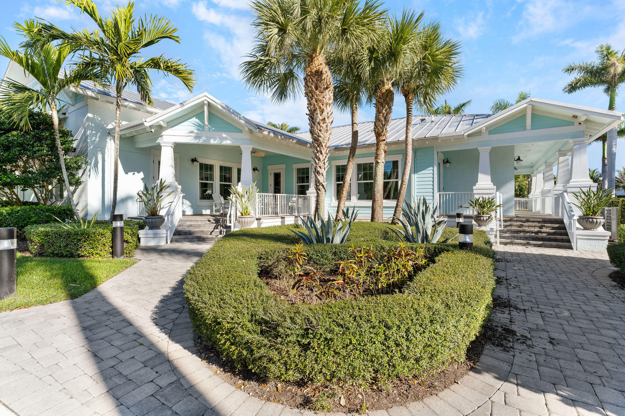 1346 Turnbridge Drive Jupiter, FL 33458 - Photo 39 of 46 a front view of a house with a garden and patio