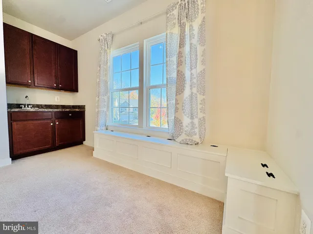 a spacious bathroom with a tub shower and sink