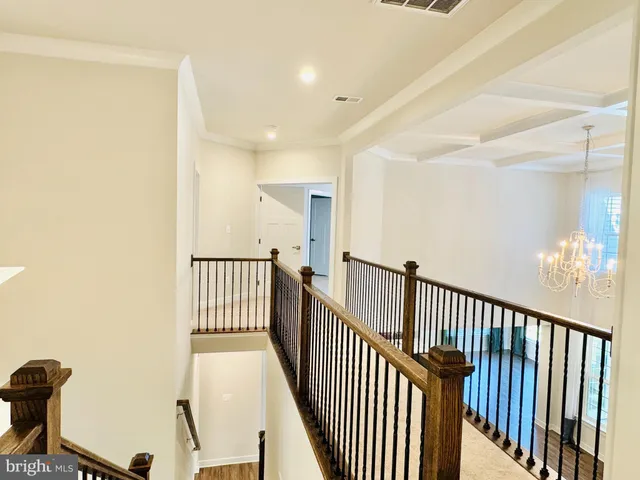 a bathroom with a cabinet a mirror and a bathtub
