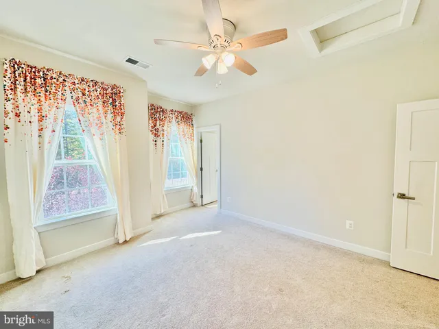 a bathroom with a sink toilet and a mirror