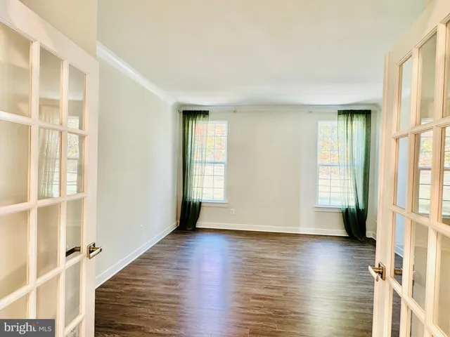 a large kitchen with stainless steel appliances kitchen island granite countertop a large counter top stainless steel appliances and cabinets