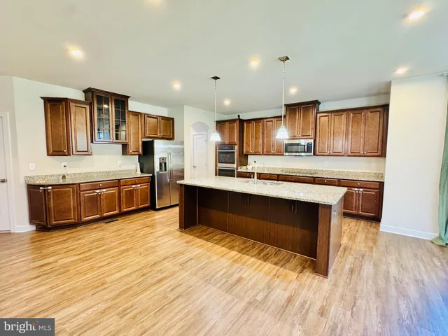 a view of a house with swimming pool yard and patio