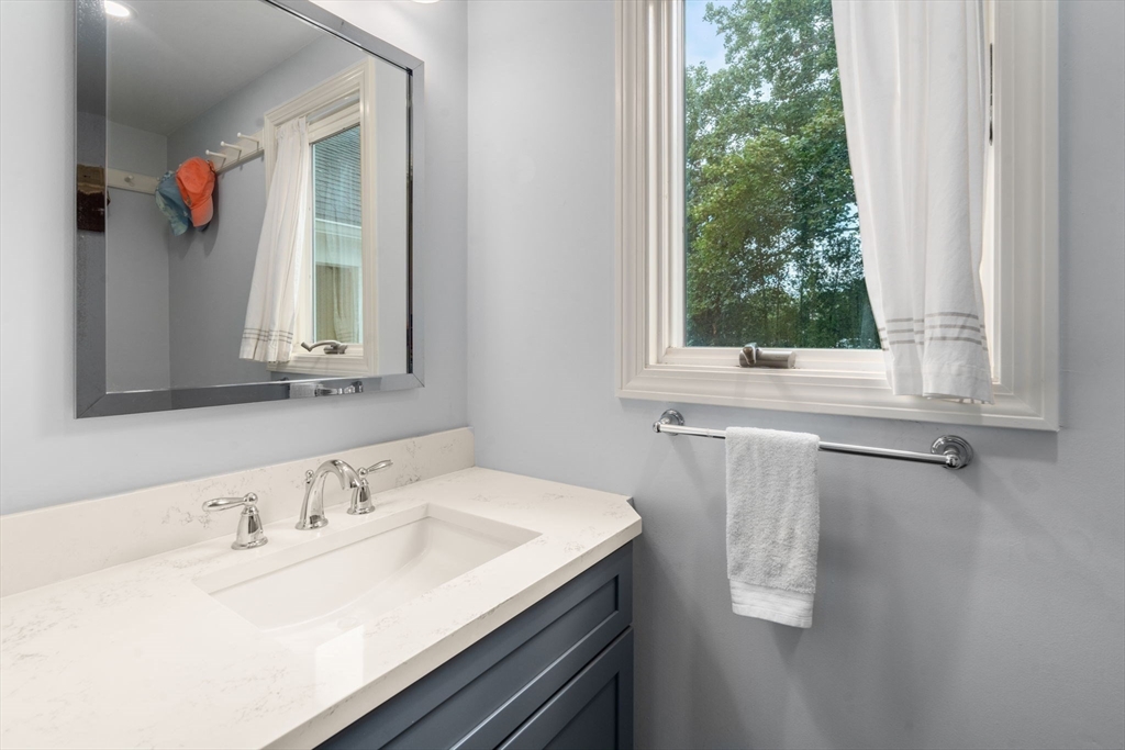 11 East Evergreen Road Natick, MA 01760 - Photo 13 of 30 a bathroom with a sink and a mirror