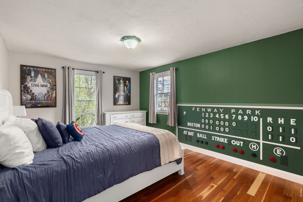 11 East Evergreen Road Natick, MA 01760 - Photo 18 of 30 a bedroom with a large bed and a window