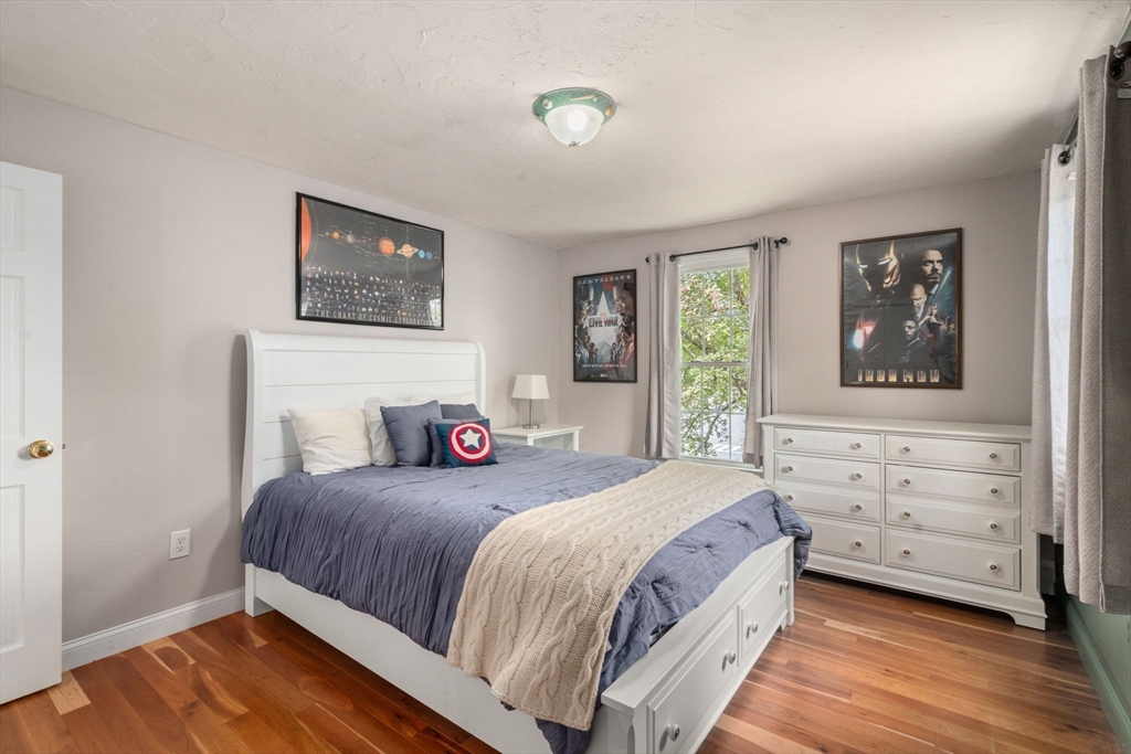 11 East Evergreen Road Natick, MA 01760 - Photo 19 of 30 a bedroom with a bed and a dresser