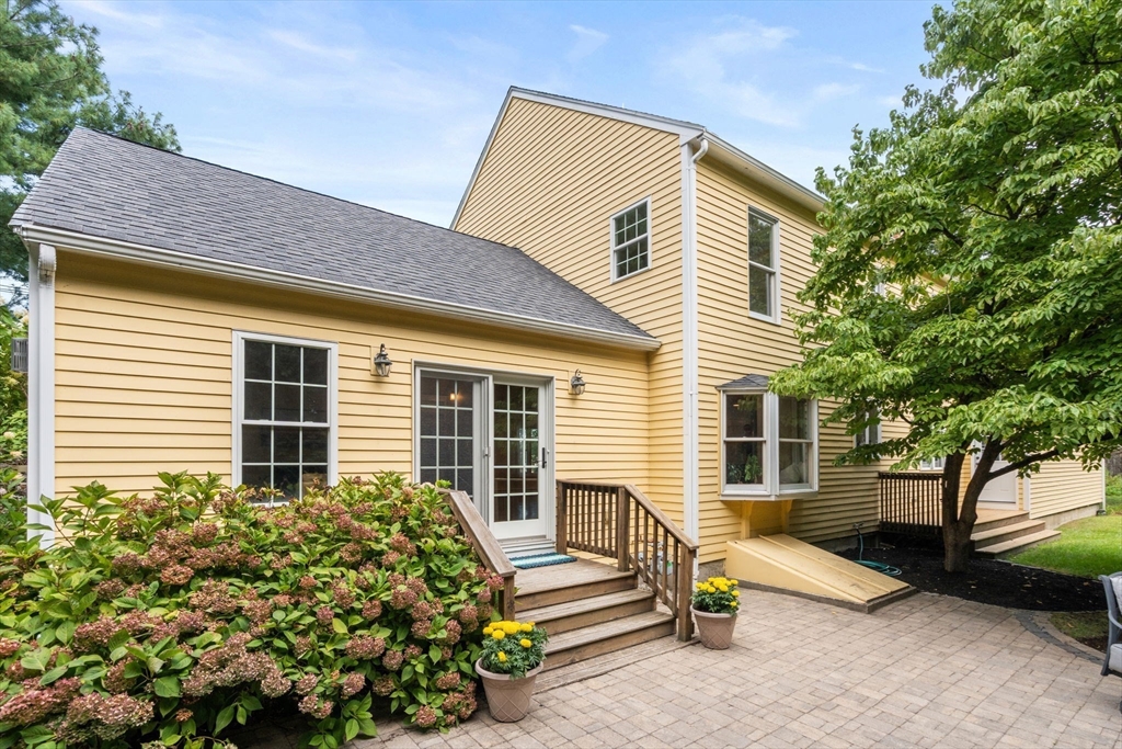 11 East Evergreen Road Natick, MA 01760 - Photo 25 of 30 a view of a house with a patio