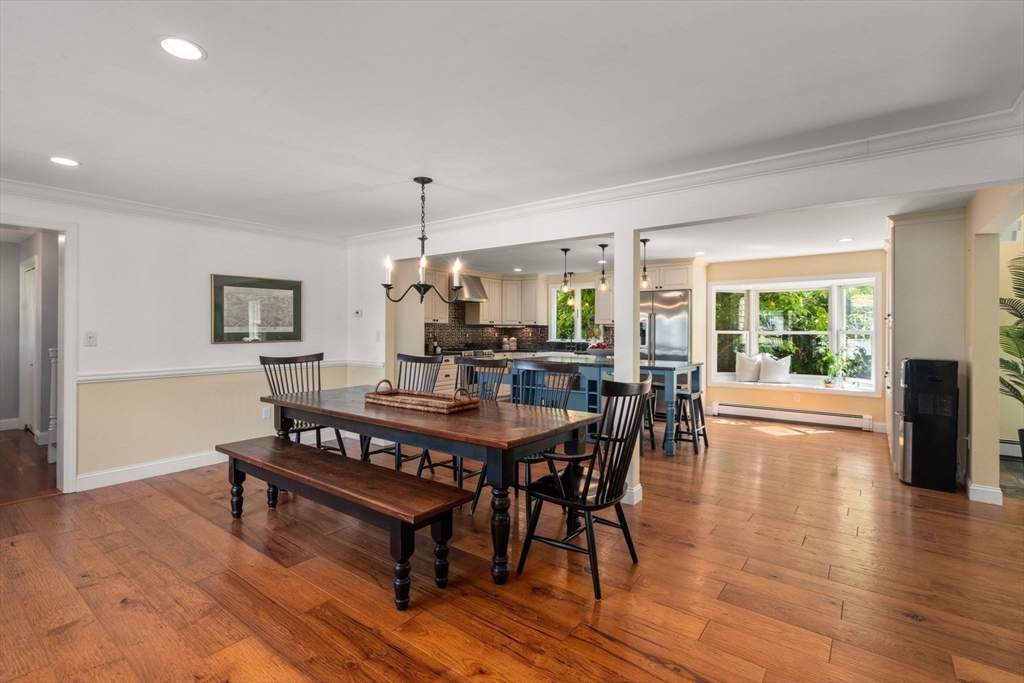 11 East Evergreen Road Natick, MA 01760 - Photo 5 of 30 a view of a dining room with furniture window and wooden floor