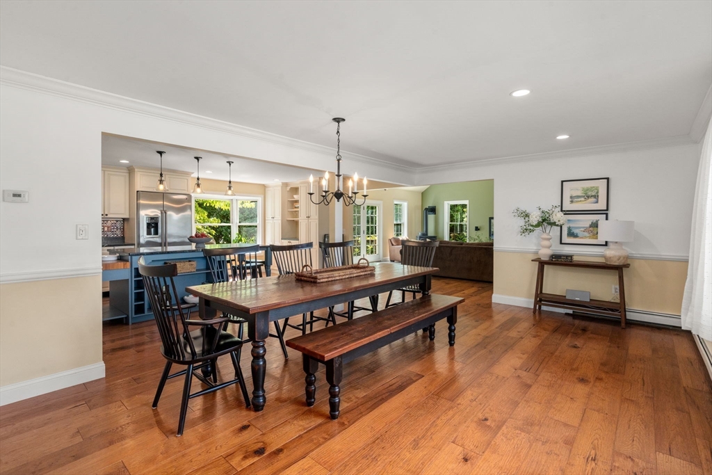 11 East Evergreen Road Natick, MA 01760 - Photo 6 of 30 a view of a dining room with furniture and wooden floor