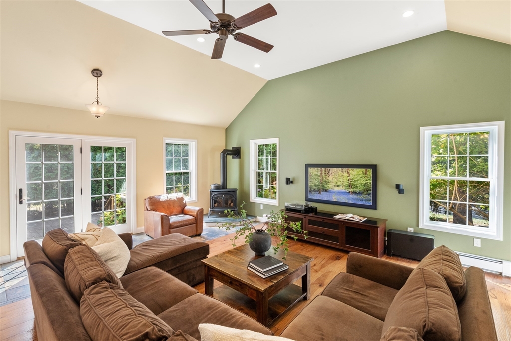 11 East Evergreen Road Natick, MA 01760 - Photo 7 of 30 a living room with furniture and a flat screen tv