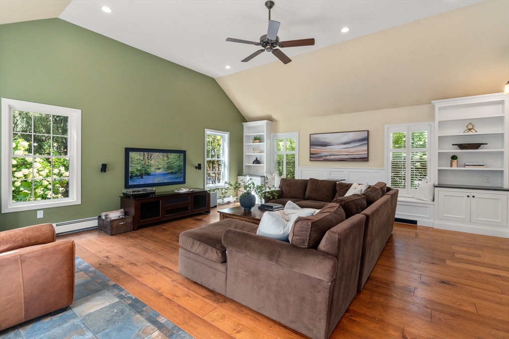 11 East Evergreen Road Natick, MA 01760 - Photo 8 of 30 a living room with furniture and a flat screen tv