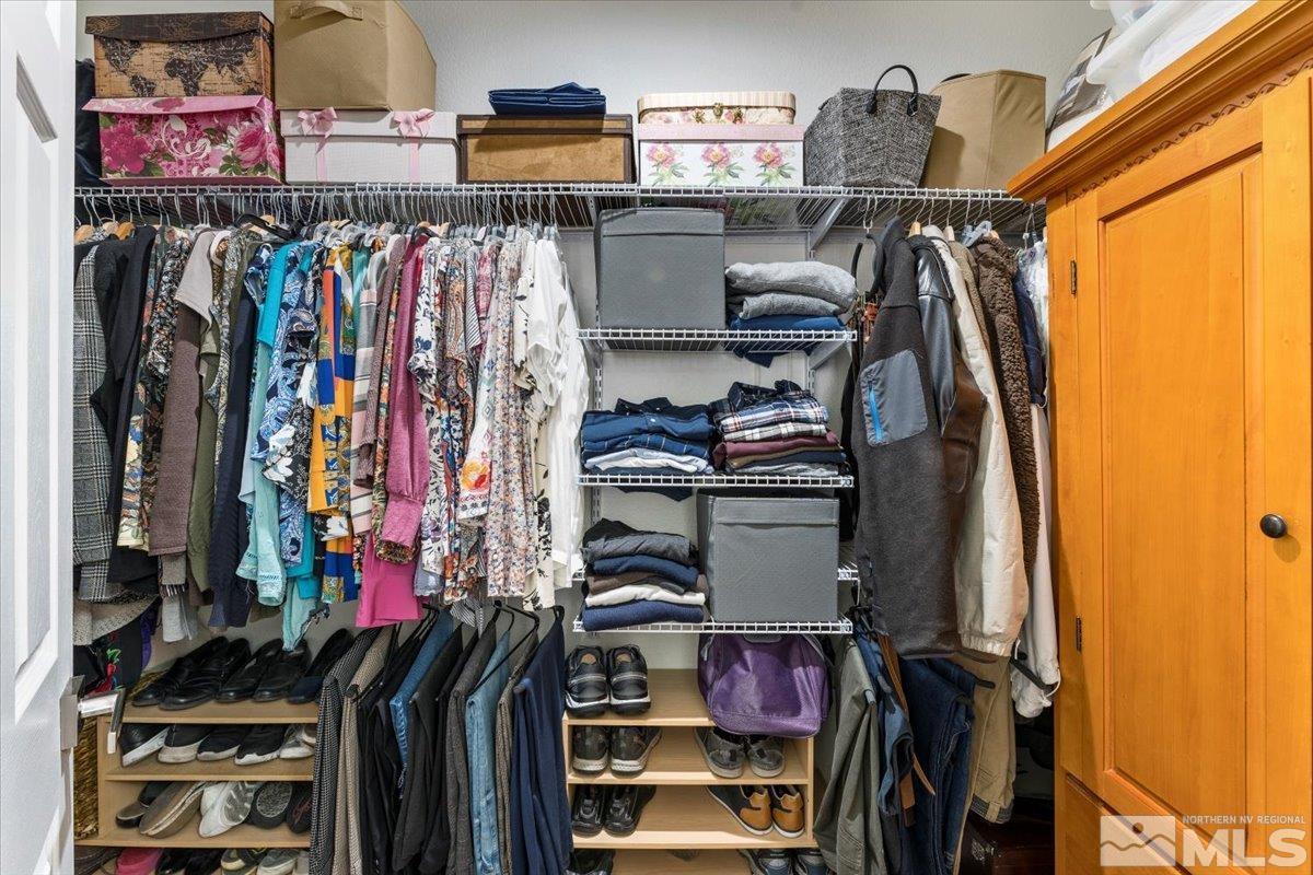 2151 Brittany Meadows Drive Reno, NV 89521 - Photo 20 of 40 a view of walk in closet with clothes and shoes