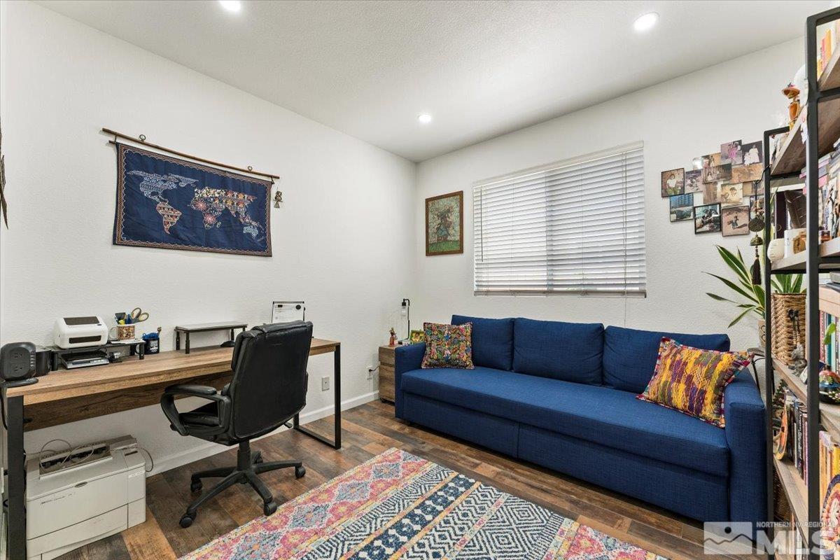2151 Brittany Meadows Drive Reno, NV 89521 - Photo 21 of 40 a view of a livingroom with workspace and a couch