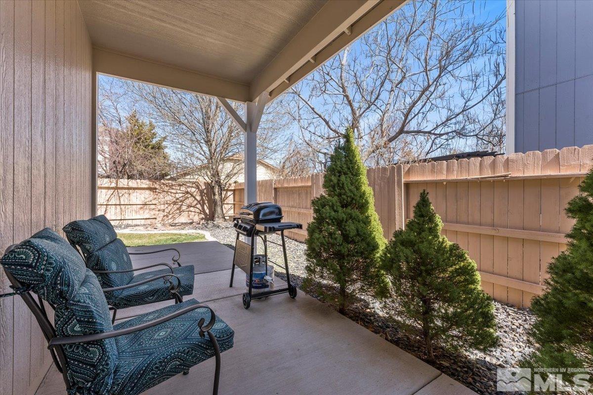 2151 Brittany Meadows Drive Reno, NV 89521 - Photo 25 of 40 a living room with furniture and a large window