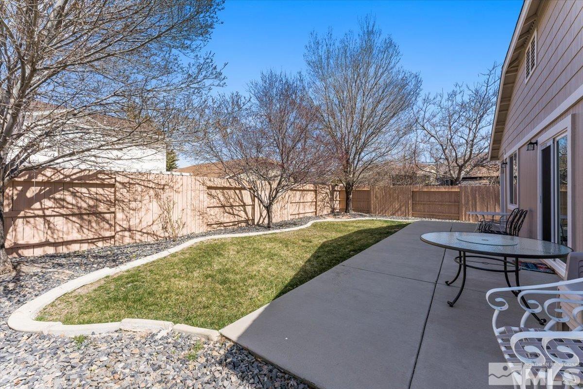 2151 Brittany Meadows Drive Reno, NV 89521 - Photo 29 of 40 a view of a backyard with wooden fence