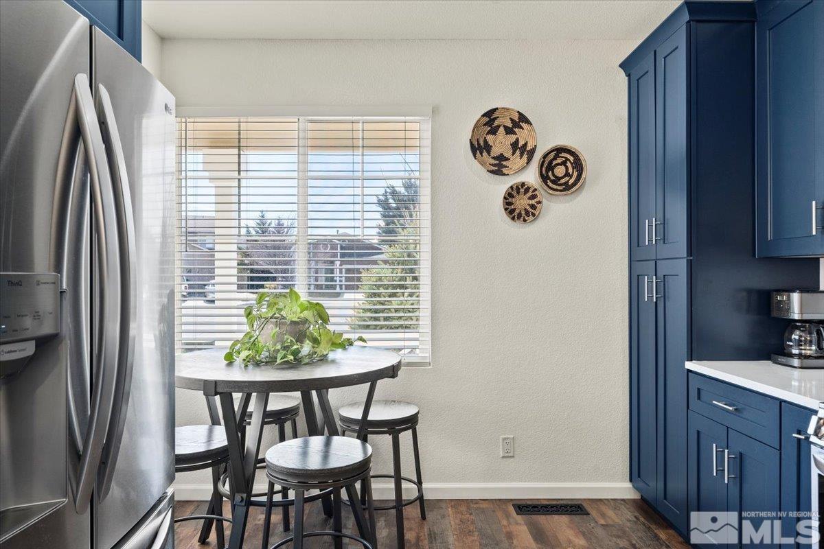2151 Brittany Meadows Drive Reno, NV 89521 - Photo 8 of 40 a view of a dining table and a window in a kitchen