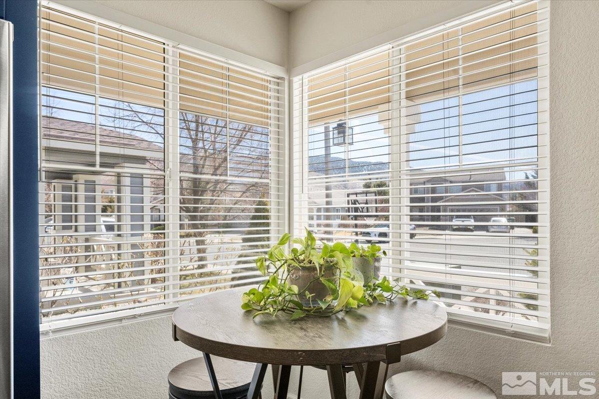 2151 Brittany Meadows Drive Reno, NV 89521 - Photo 9 of 40 a view of a dining room with a table and chairs