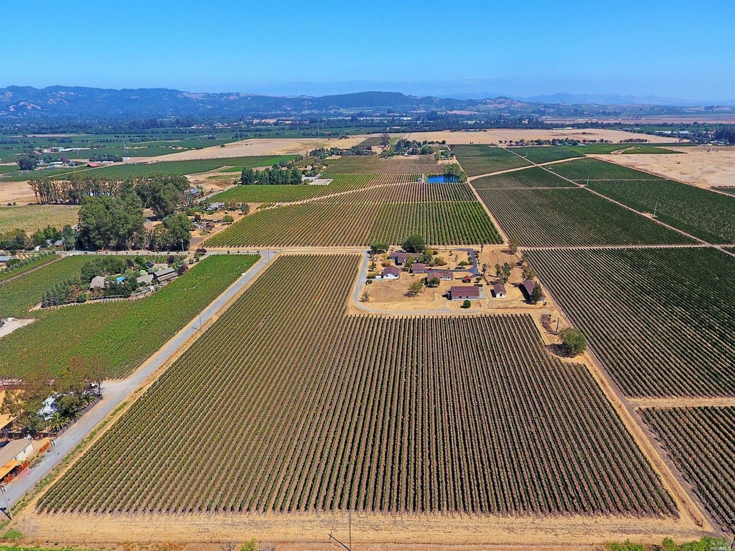 22255 Bonness Road Sonoma, CA 95476 - Photo 1 of 1 an aerial view of a tennis court