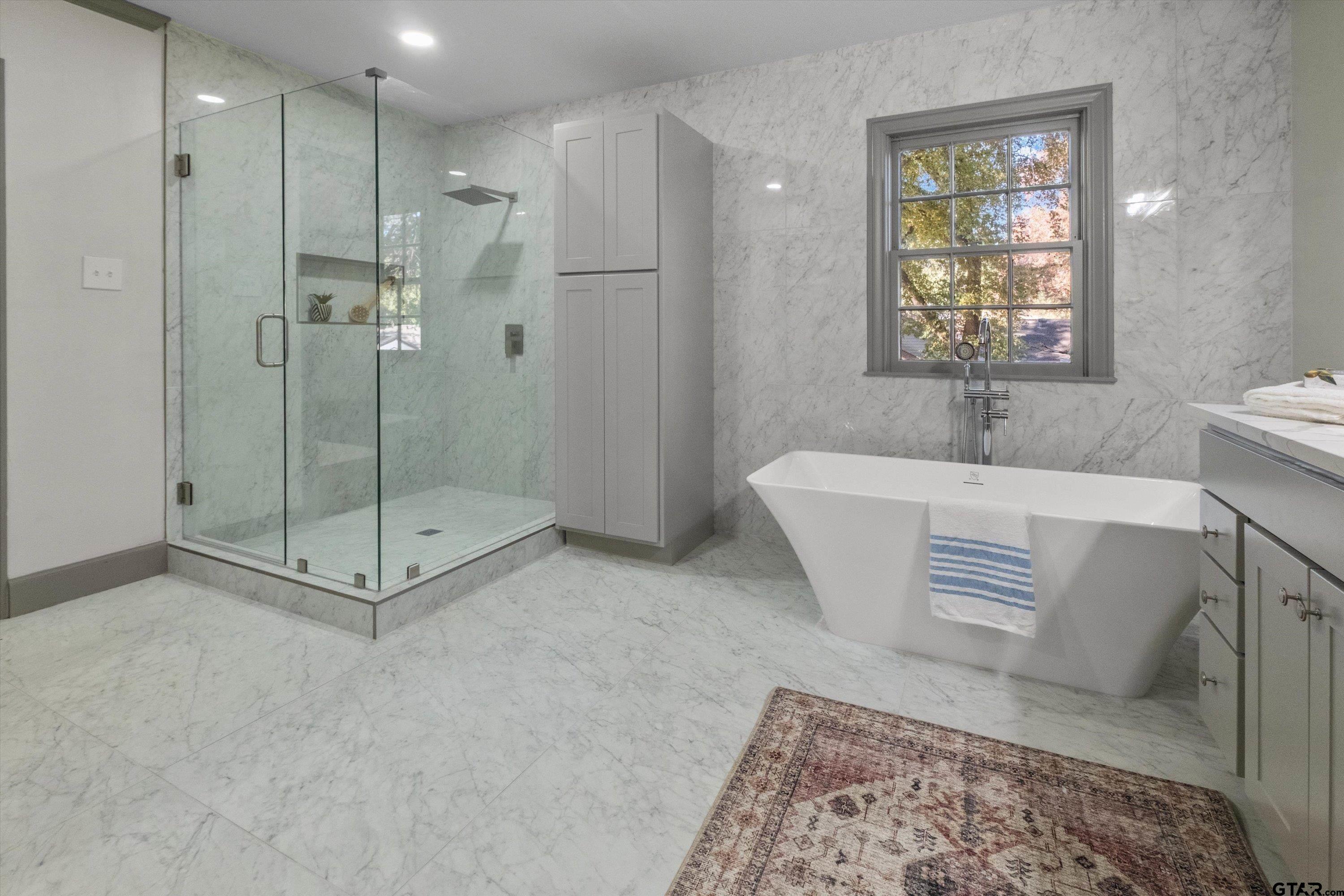 2126 McDonald Road Tyler, TX 75701 - Photo 15 of 26 a living room with a couch and a table