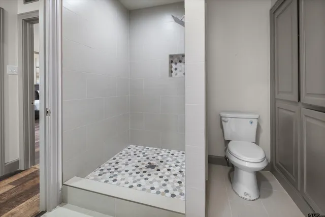 a bathroom with a toilet and a sink