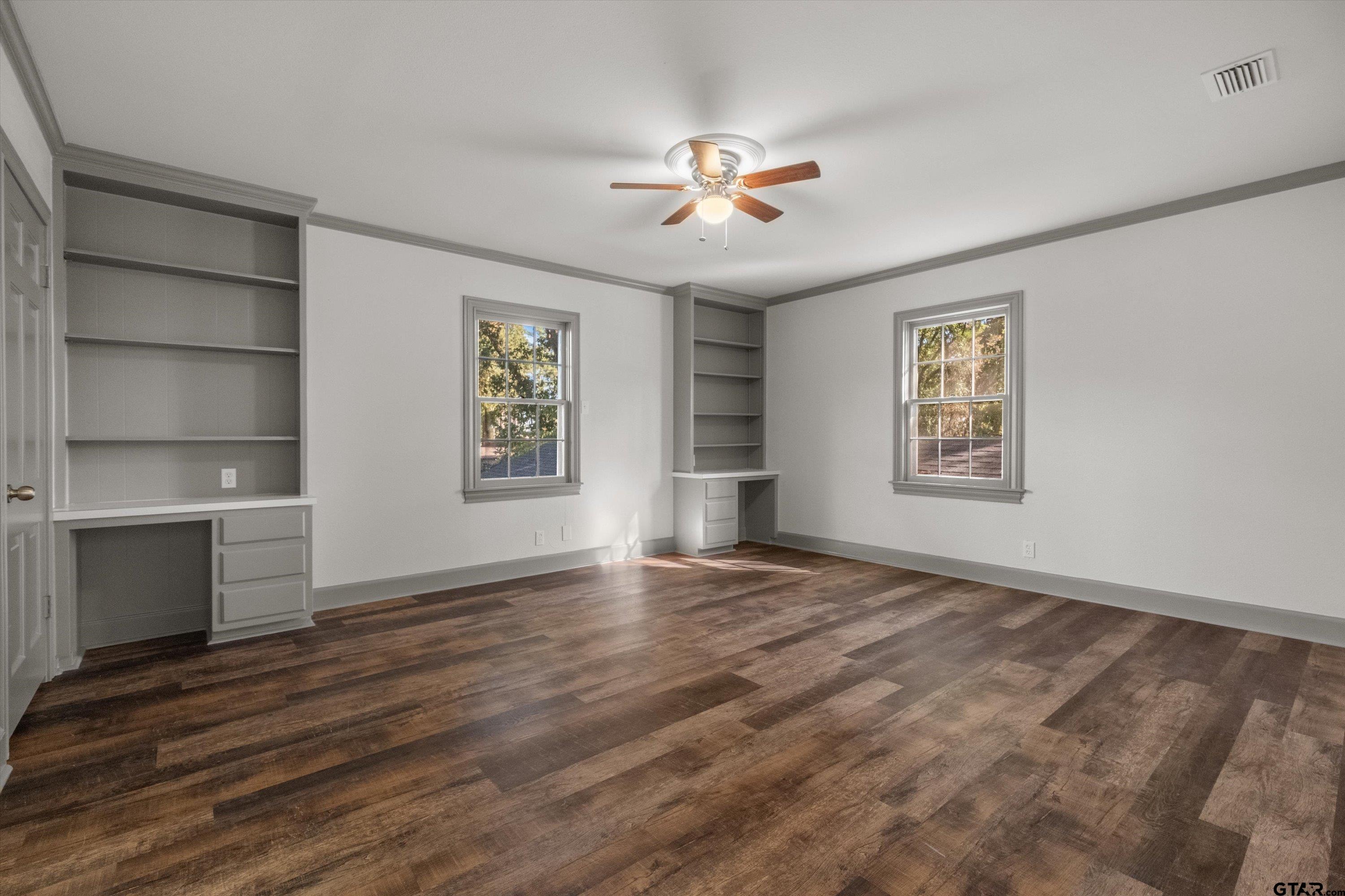 2126 McDonald Road Tyler, TX 75701 - Photo 26 of 26 a view of an empty room with a window and wooden floor