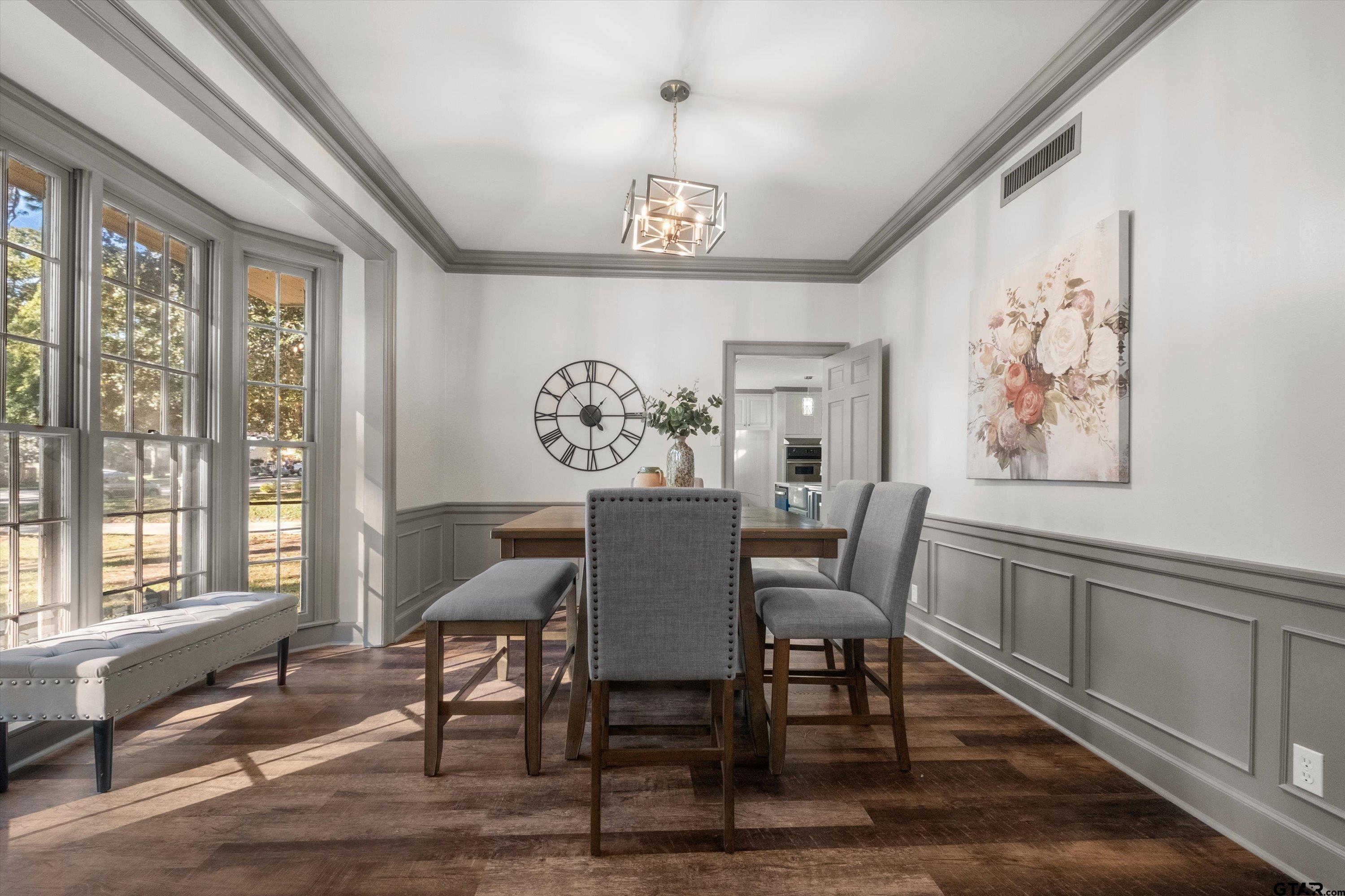2126 McDonald Road Tyler, TX 75701 - Photo 4 of 26 a view of a dining room with furniture window and wooden floor