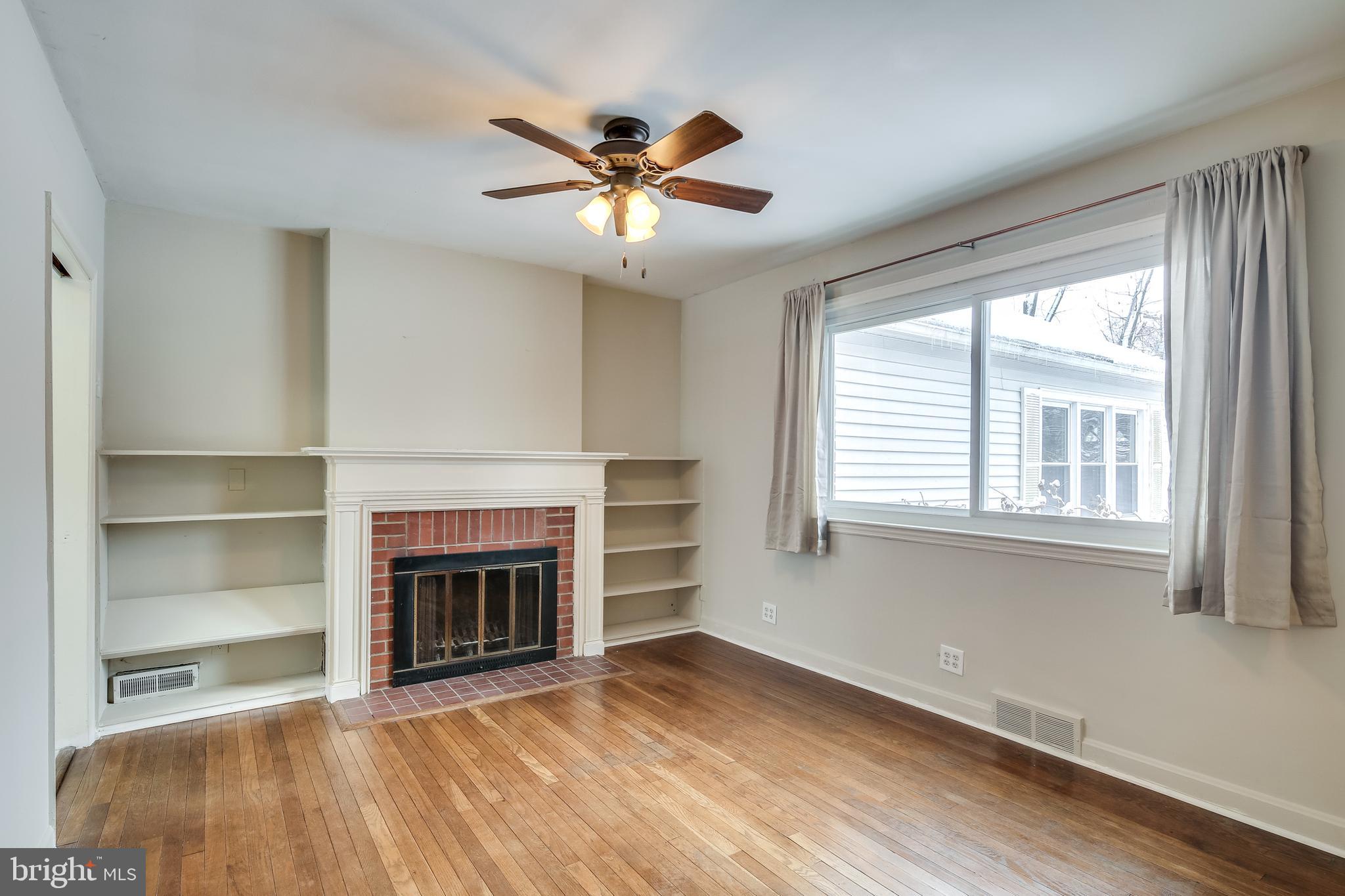 1206 Ednor Road Silver Spring, MD 20905 - Photo 16 of 51 Family Room/ 3rd Bedroom Option Has Fireplace