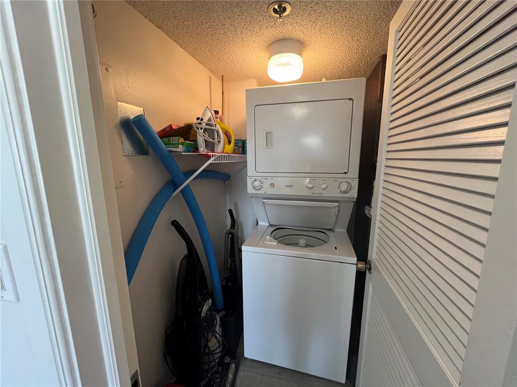 3160 Matecumbe Key Road, Unit 235 Punta Gorda, FL 33955 - Photo 9 of 15 a utility room with dryer and washer