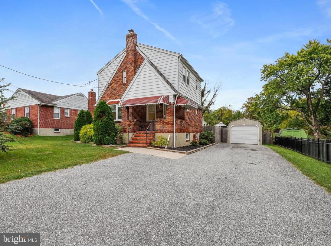 a view of house with outdoor space and street view