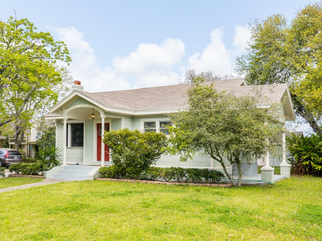 4528 Avenue R 1/2 Galveston, TX 77551 - Photo 3 of 22 a front view of house with yard and green space