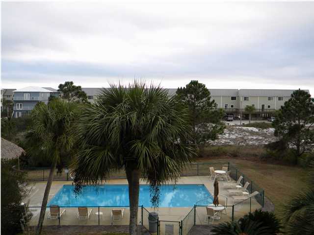 5399 Hwy Santa Rosa Beach, Unit 203 30A Santa Rosa Beach, FL 32459 - Photo 20 of 22 a view of a lake with a yard