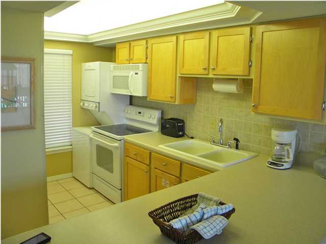 5399 Hwy Santa Rosa Beach, Unit 203 30A Santa Rosa Beach, FL 32459 - Photo 3 of 22 a bathroom with a sink and a mirror