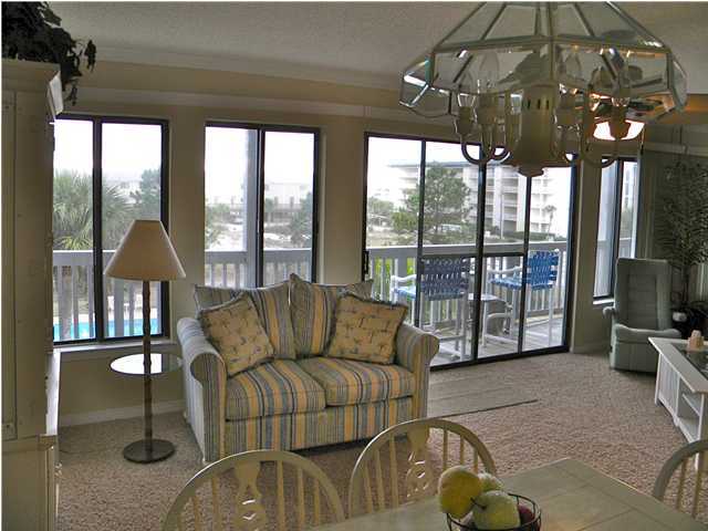 5399 Hwy Santa Rosa Beach, Unit 203 30A Santa Rosa Beach, FL 32459 - Photo 7 of 22 a living room with furniture and a flat screen tv