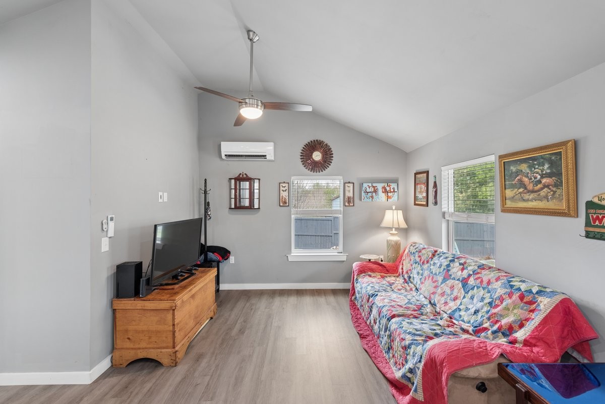 150 Crawford Hill Road Goodlettsville, TN 37072 - Photo 15 of 30 a living room with furniture and wooden floor