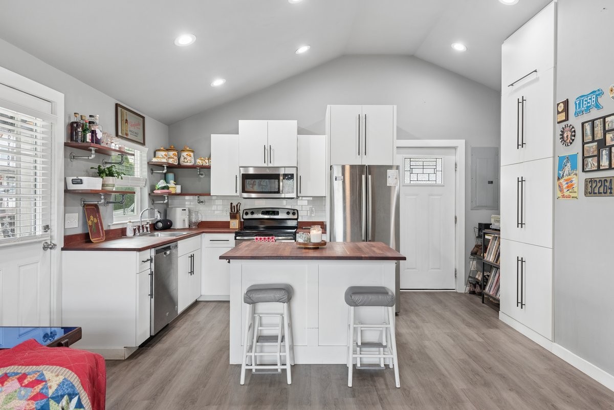 150 Crawford Hill Road Goodlettsville, TN 37072 - Photo 21 of 30 a kitchen with stainless steel appliances a refrigerator and a stove top oven
