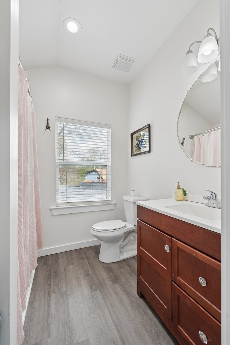 150 Crawford Hill Road Goodlettsville, TN 37072 - Photo 25 of 30 a bathroom with a toilet a sink and mirror
