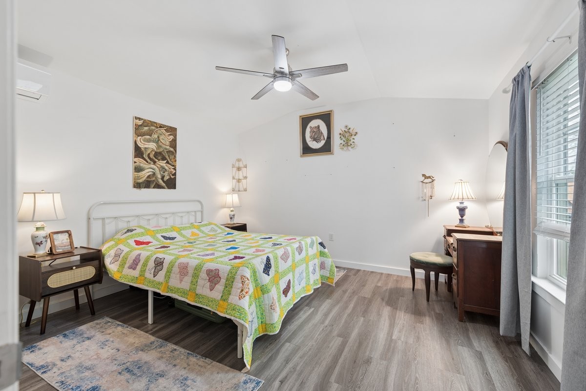 150 Crawford Hill Road Goodlettsville, TN 37072 - Photo 28 of 30 a bedroom with a bed and a table in it