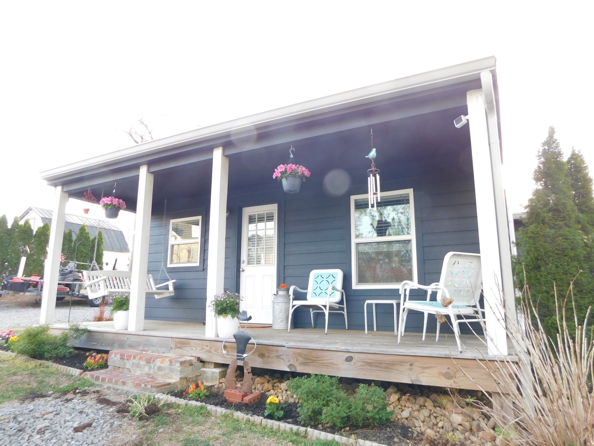 150 Crawford Hill Road Goodlettsville, TN 37072 - Photo 4 of 30 a view of house with patio outdoor dining space and chairs