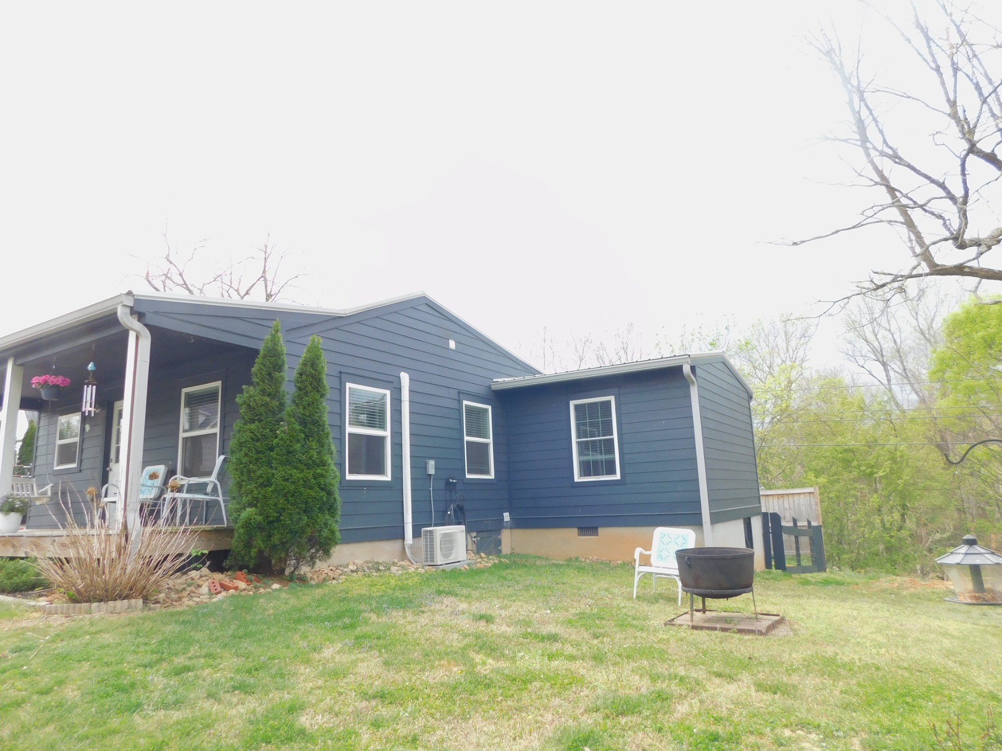 150 Crawford Hill Road Goodlettsville, TN 37072 - Photo 10 of 30 a backyard of a house with yard and barbeque oven