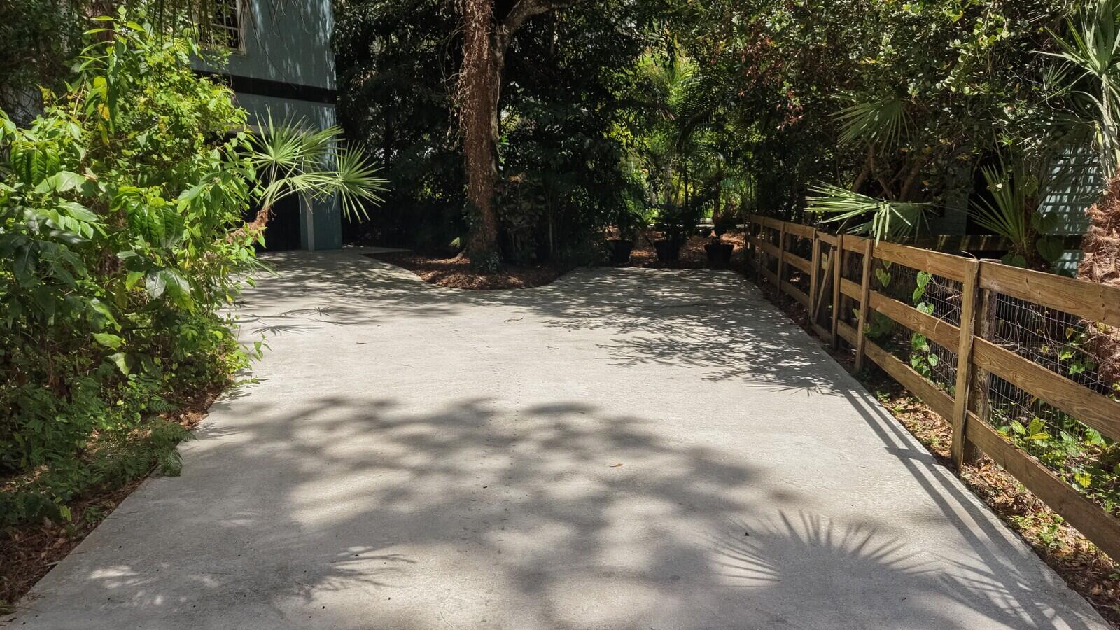 12566 Old Indiantown Road Jupiter Farms, FL 33478 - Photo 2 of 2 a view of backyard with green space