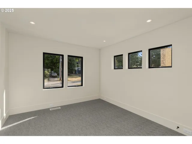 a view of an empty room with window