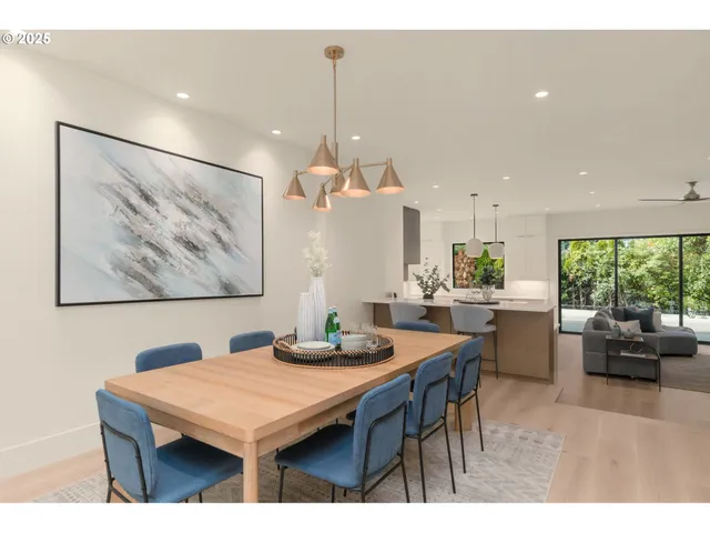 a room with furniture a window and kitchen view