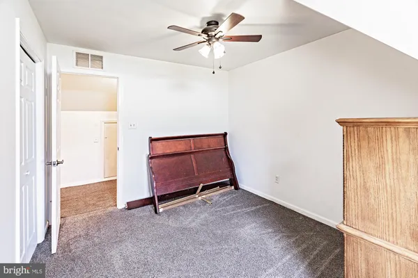 a view of a room with toys and windows