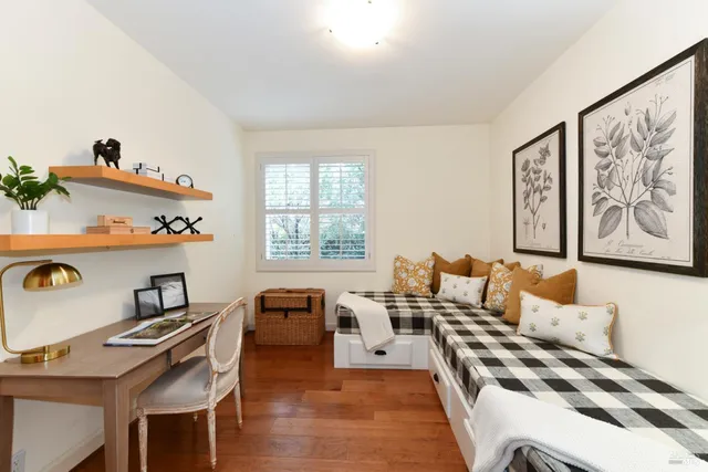 a living room with furniture and a window