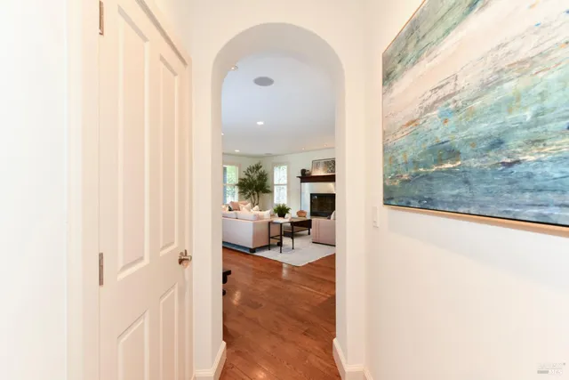 a view of a living room with a floor to ceiling window and floor to ceiling window