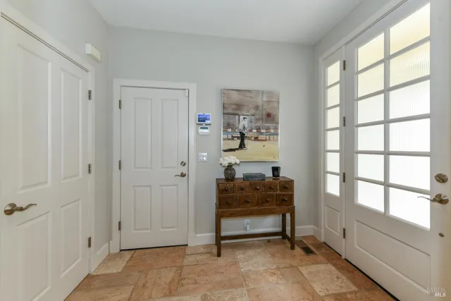 a view of room with window and furniture