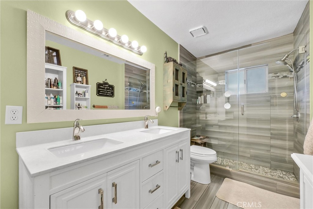 2006 Peyton Road La Verne, CA 91750 - Photo 13 of 17 a bathroom with a sink a toilet and shower