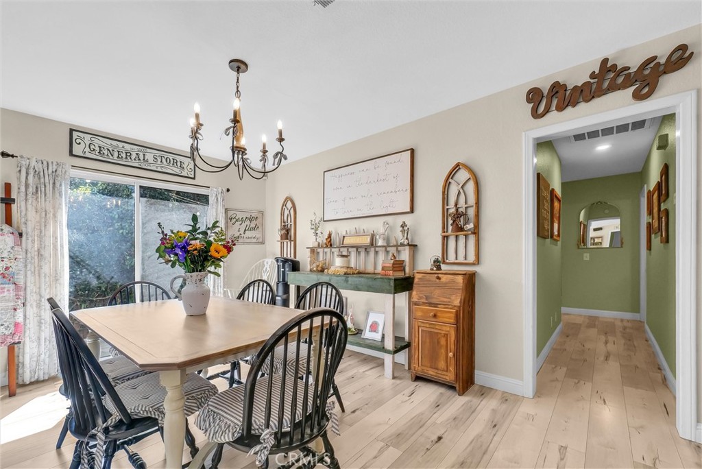 2006 Peyton Road La Verne, CA 91750 - Photo 10 of 17 a view of a dining room with furniture wooden floor and chandelier